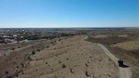 02 Desert Aerial Fly Over Off Roading Polaris on Sandy Foothill Stock Footage 323774082