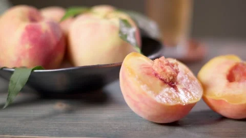 02 Fresh Cut Peach Close Up Showing Juicy Fruit Texture Stock Footage 344246476