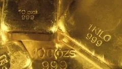 Gold bullion bars of different ounces