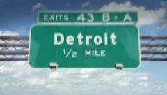 A Highway/Interstate sign going into the city of Detroit, Michigan.