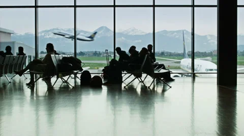 0206 Airport lounge. An airplane is taking off on the background Stock Footage
