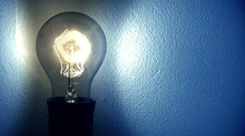0214 Vintage bulb on a wall with a cold light Stock Footage 33701204