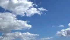 White clouds on blue sky. Time-lapse motion background 1080p