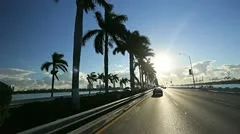 P.O.V. driving Miami city causeway at sunset, Florida, USA