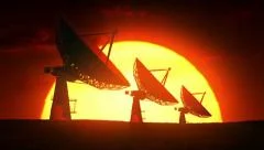 Satellite dishes at sunrise