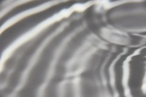 023.An abstract background of undefined shapes with various shades and wave.. Stock Photos