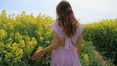 Young Woman in Vintage Dress Walking Down Path Yellow Flowers Spring Field HD