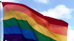Waving rainbow flag of LGBT people (Castro, San Francisco)