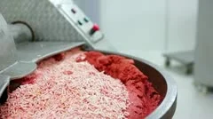 Mixing mince meat with spices