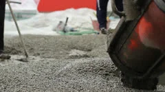 Cement mixer pours fresh concrete