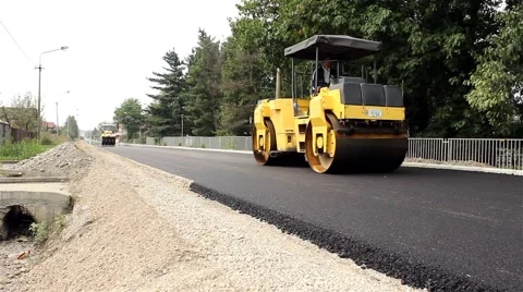 024 Road rollers flattens asphalt. Steamrollers. Paving. Asphalting. Stock Footage 41731289