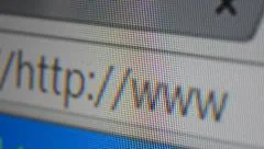 http www address bar. close up of mouse cursor typing in web browser address