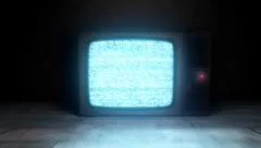 shot of camera entering tv with static noise