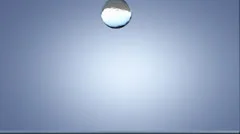 slow motion high-detailed splash of drop falling into water