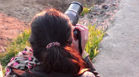 0251 Photographer on the beach Stock Footage 36712442