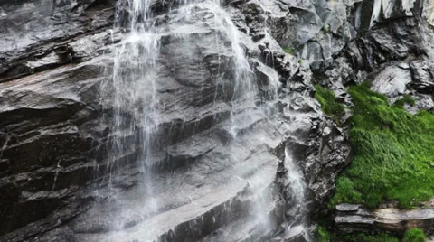 0253 Stream of water falling in Alps Mountain in Austria. Stock Footage 33755596