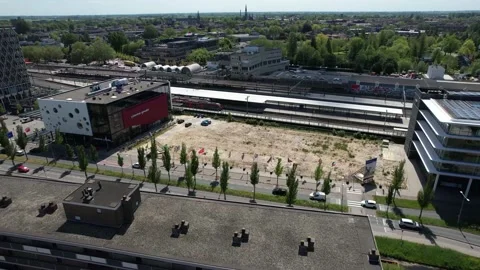 026 - Gouda - 71 Flags - Cinema Gouda - Treinstation - De Koploper Stock Footage 228687346