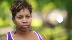 Black African-American woman serious sad concerned worried face