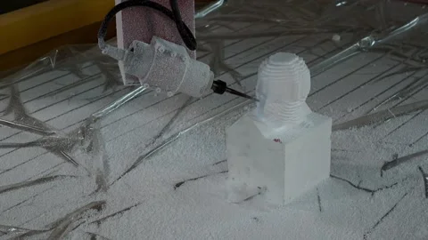 027 production of a 3d model of the head made of foam on a five-axis cnc mac Stock Footage 154897215