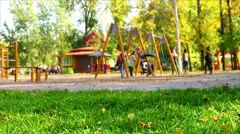 Playground in park, children play, run, have fun.