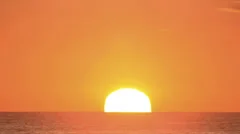 Ocean sunrise in clear sky time lapse zoom for big sun HD 1080