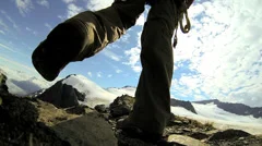 Mountain climber wearing equipment ridge walking, Alaska, USA