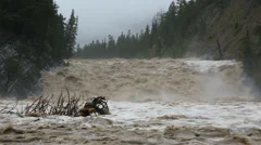 Flood water swollen river Alberta, Canada