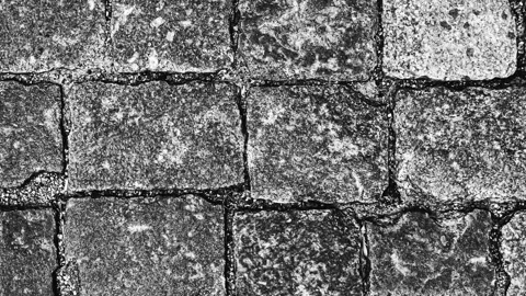 028_Rough stone pavement texture background.mp4 Stock Footage 345726327