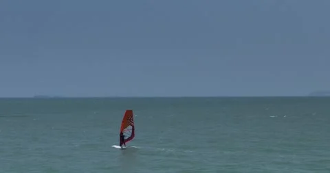 03 windsurfer riding waves at open sea Video stock 239542119