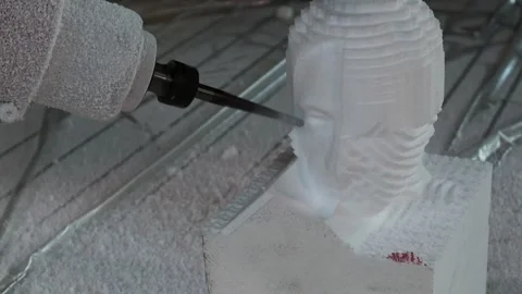 030 production of a 3d model of the head made of foam on a five-axis cnc mac Stock Footage 154897256