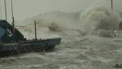 Hurricane Storm Surge Waves Crash Into Harbor