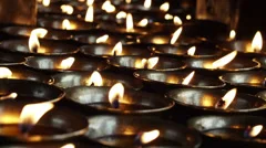Candles Burning in Buddhist Temple