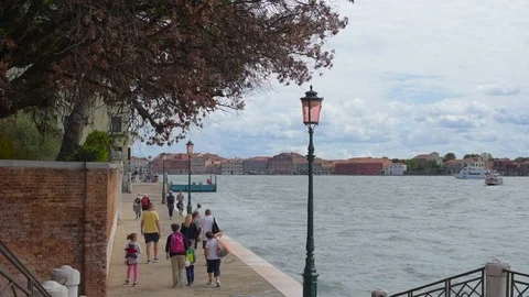 03/09/2017 - beautiful view of canals with people, boats and buildings in Venice Stock Footage 82698183