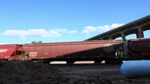 031 long time lapse pan in train yards of Kansas City under the 12th St. bridge Stock Footage 32286100