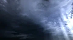 Seamless loop of storm clouds with rays. Time-lapse motion background 1080p