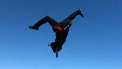 Ninja flips in air, slow motion