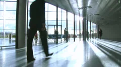Business group in a large contemporary office building. High quality HD video
