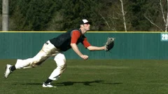 Baseball player catching ball, slow motion