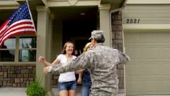 Family runs out to greet soldier