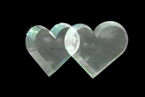 0329 two 2 crystal heart spinning around Stock Footage