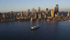 Aerial shot of ferry and Seattle skyline
