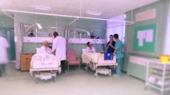 Time lapse of medical staff taking care of patients on a busy hospital ward
