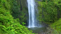 majestic lush tropical jungle waterfall in hawaii