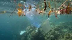 Plastic bags and other garbage floating in ocean