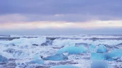 ocean wave smashing Iceberg stuck
