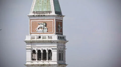 0340 Venice St Mark's Tower Bell. A plane is taking off Stock Footage 37323893
