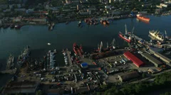 Aerial View. Flying over the seacoast. Harbor of the Vladivostok city.