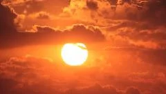 Sun, clouds and red sky - close-up - Sunrise TImelapse