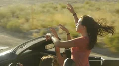 Girls Sing And Dance To Car Radio