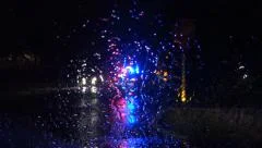 Night Storm Road Traffic - Police Car - Sirene Lights - Rainy Windshield Glass
